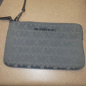Medium wristlet gray by Michael Kors.
